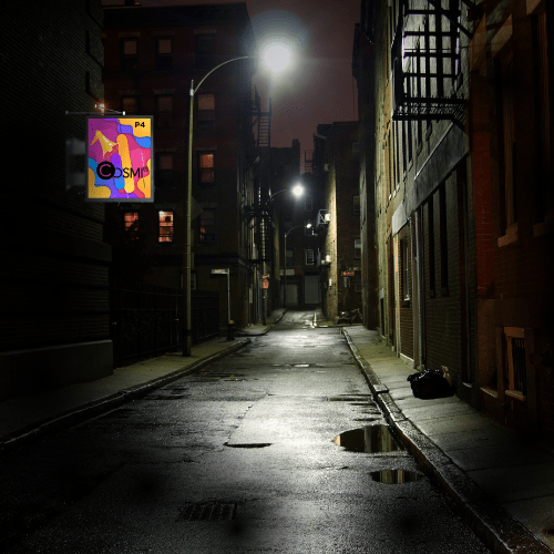 imagen de la banderola VL en medio de una calle por la noche